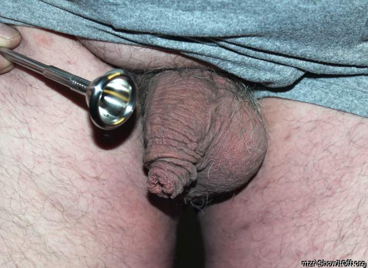 I'm playing with the my foreskin with a circumcision stapler (fig.9)