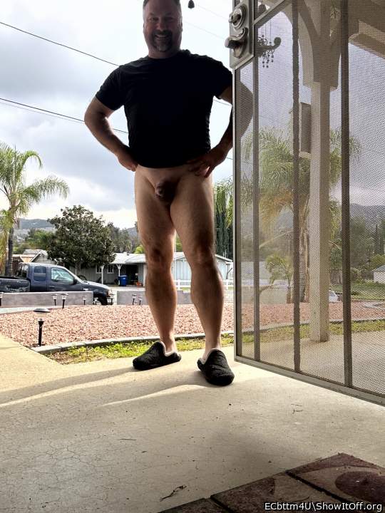 Risky nude in the front yard