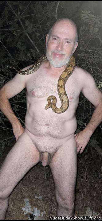 Naked in forest with boa
