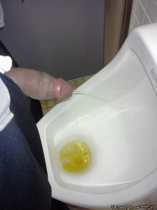showing it off in the mens room.