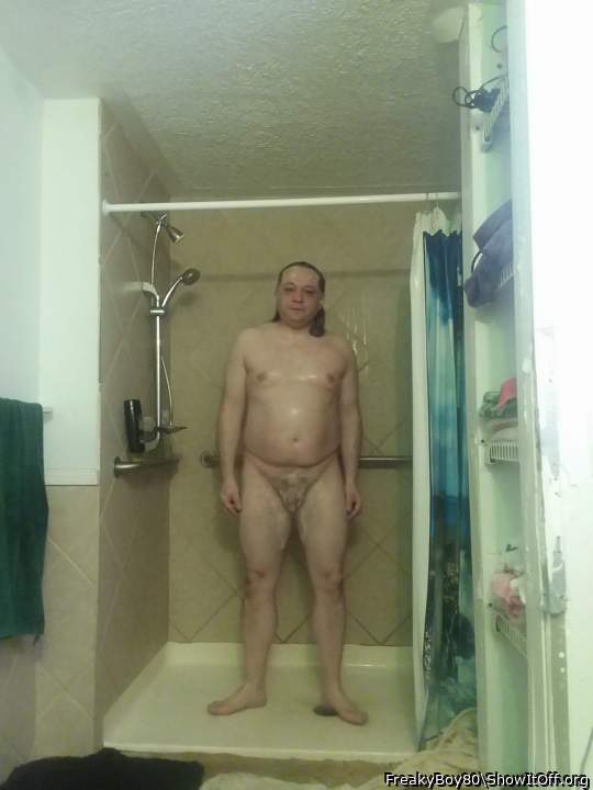 Derek Hall soapy and naked in the shower.