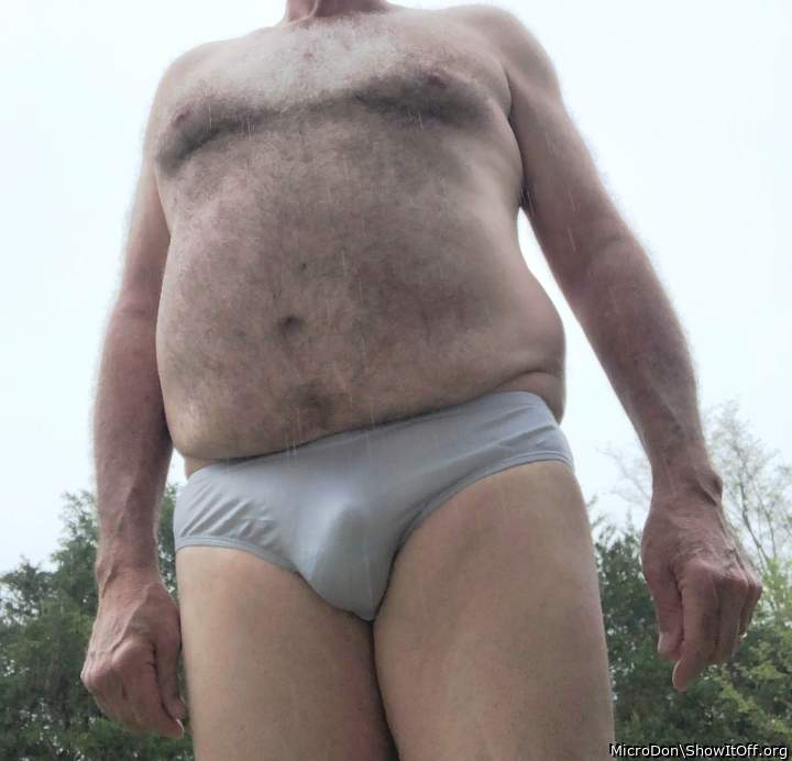 Wearing only panties in the rain
