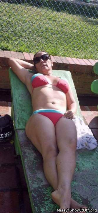 Very pretty lady enjoying the warmer weather.  So nice to se