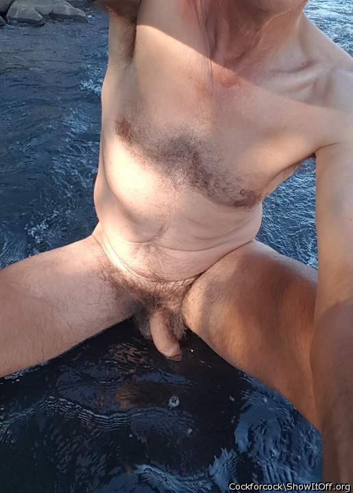 Nude fun in a stream