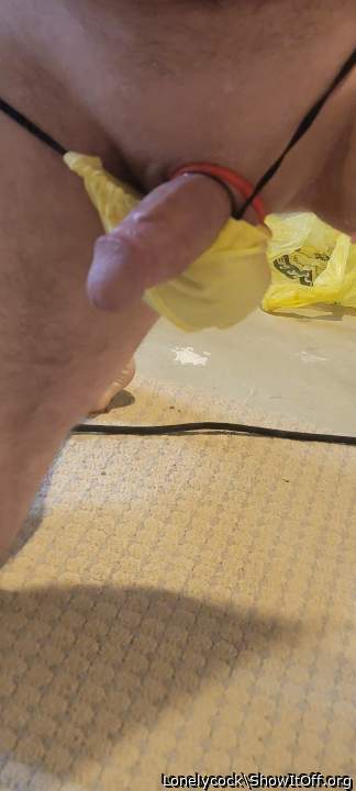 Hot combo, shaved cock in a hot pouch!