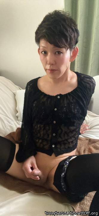 Serena is wearing a gorgeous girly lace top and denim skirt.