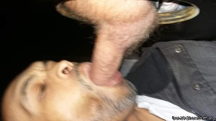 Me sucking a stranger thru a gloryhole.