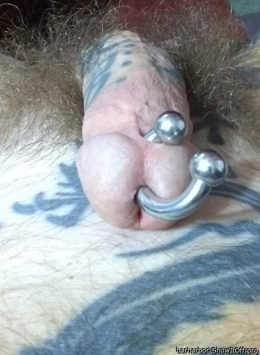 Tattooed and pierced.