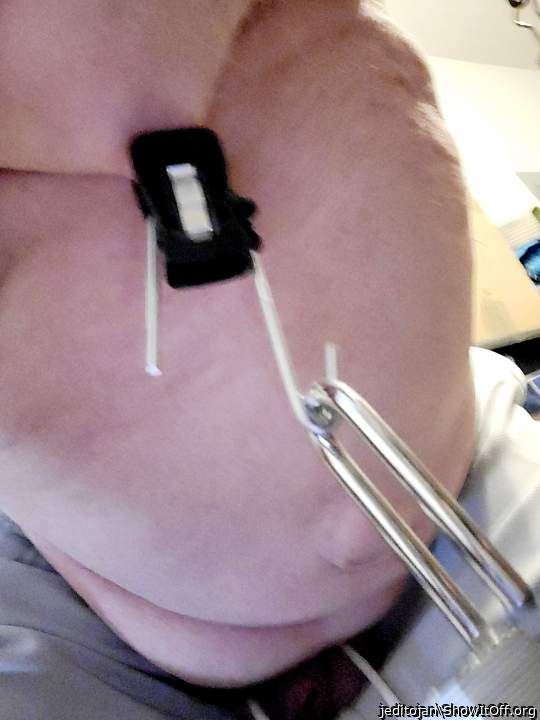 stretching my left nipple