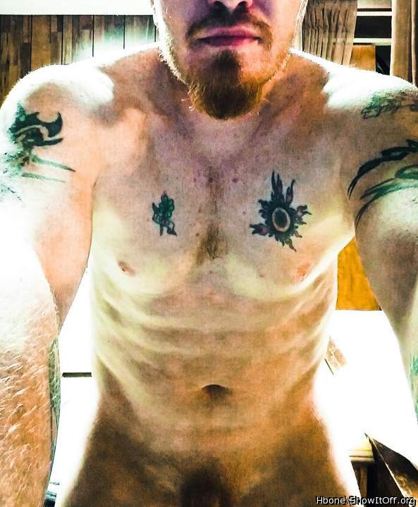Your so sexy! I love those muscles and tats.  
