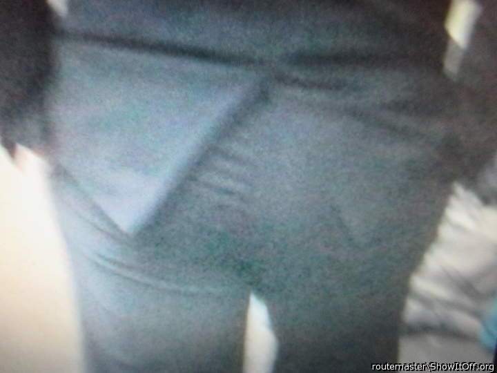 My hands in pockets tight suited ass