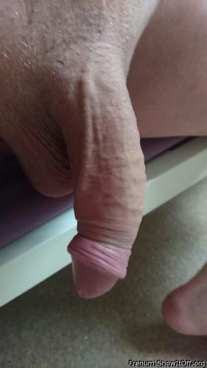 Flaccid with foreskin retracted.