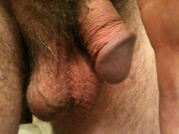 Lovely cock head and heavy hanging balls