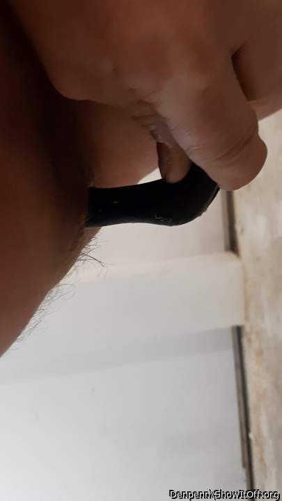 Playing with my but plug