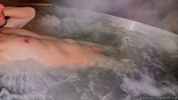 Next to the little duck, the big duck swims in the large external hot tub.