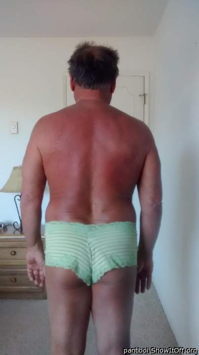this a green panty, from behind