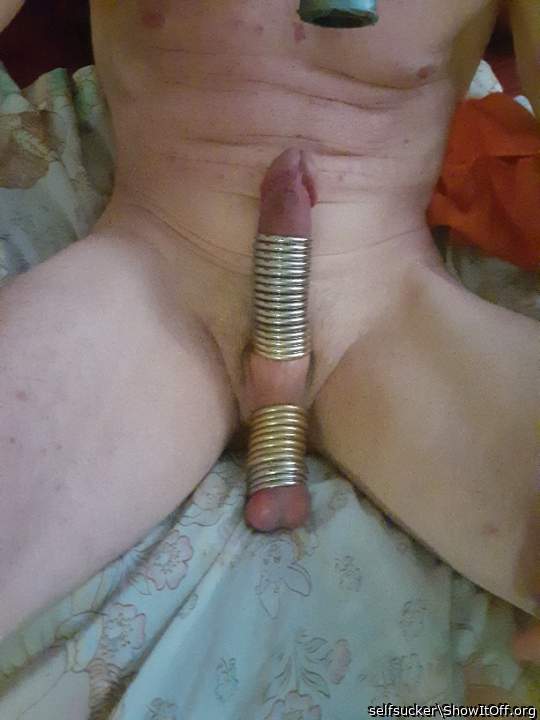 lovely totem pole of rings and genitals