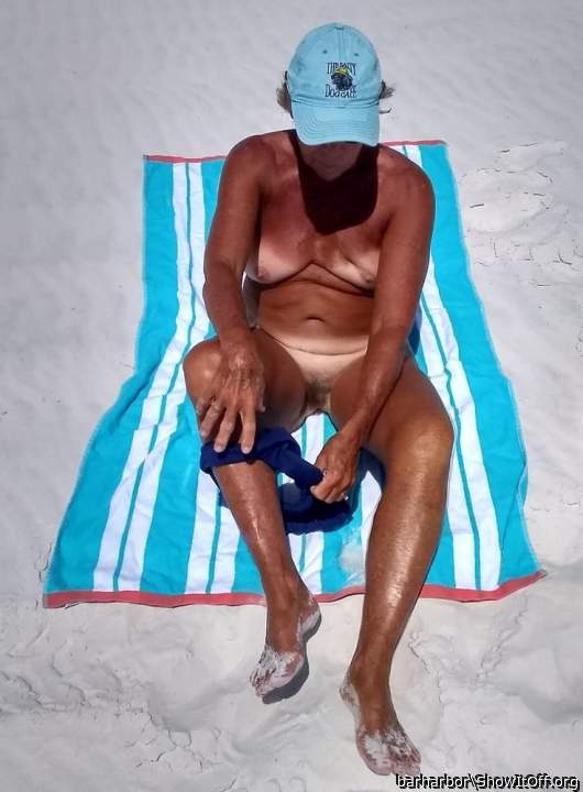 Getting bare in the sun for the voyeurs