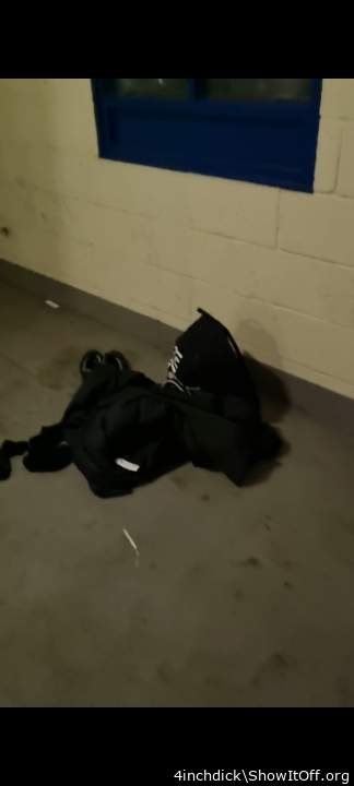 My clothes on car park floor