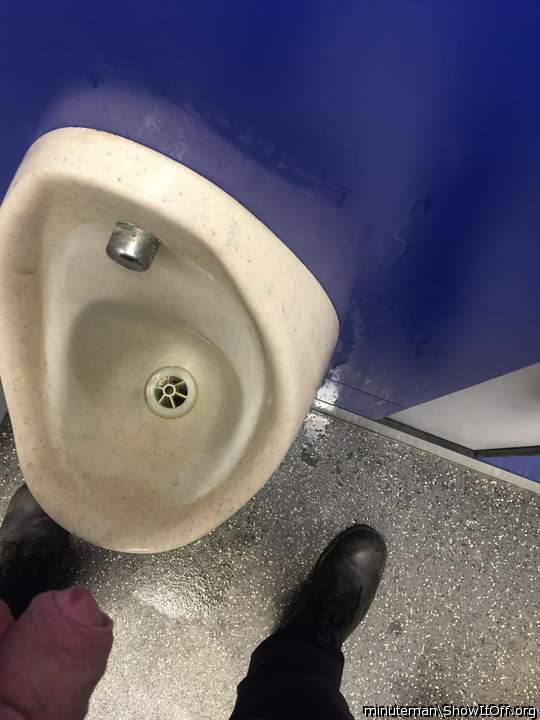 Pissing and texting = wet wall and wet floor!! Oops!