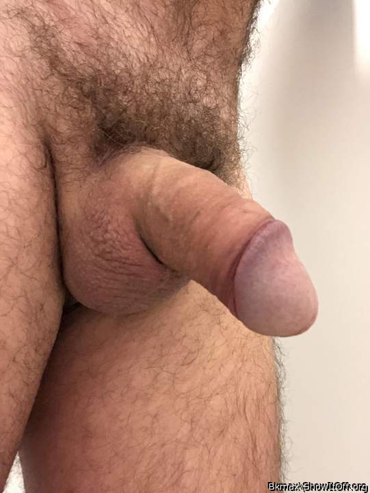 Uncut but rolled back and tucked