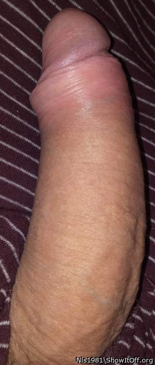 Soft and thick. Foreskin pulled back.