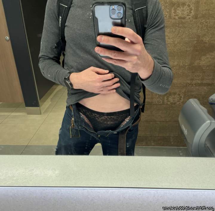 flashing my panties and stockings in the mens room