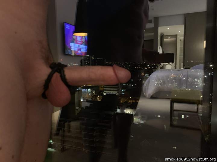 showing off at the hotel window
