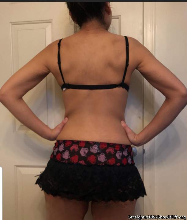 From behind