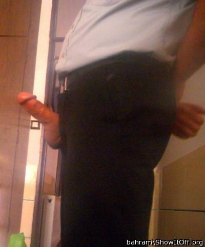 A huge stiff cock sticking out of a pair of pants is such a 