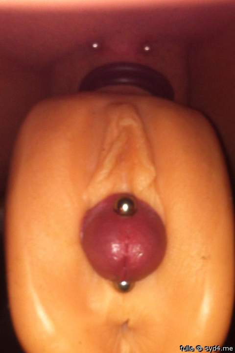 pierced knob poking out of pussy