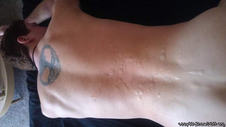 A giant load of BBC cum on my back..