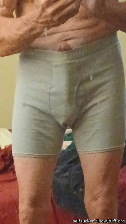 frontal with cockhead poking above waist